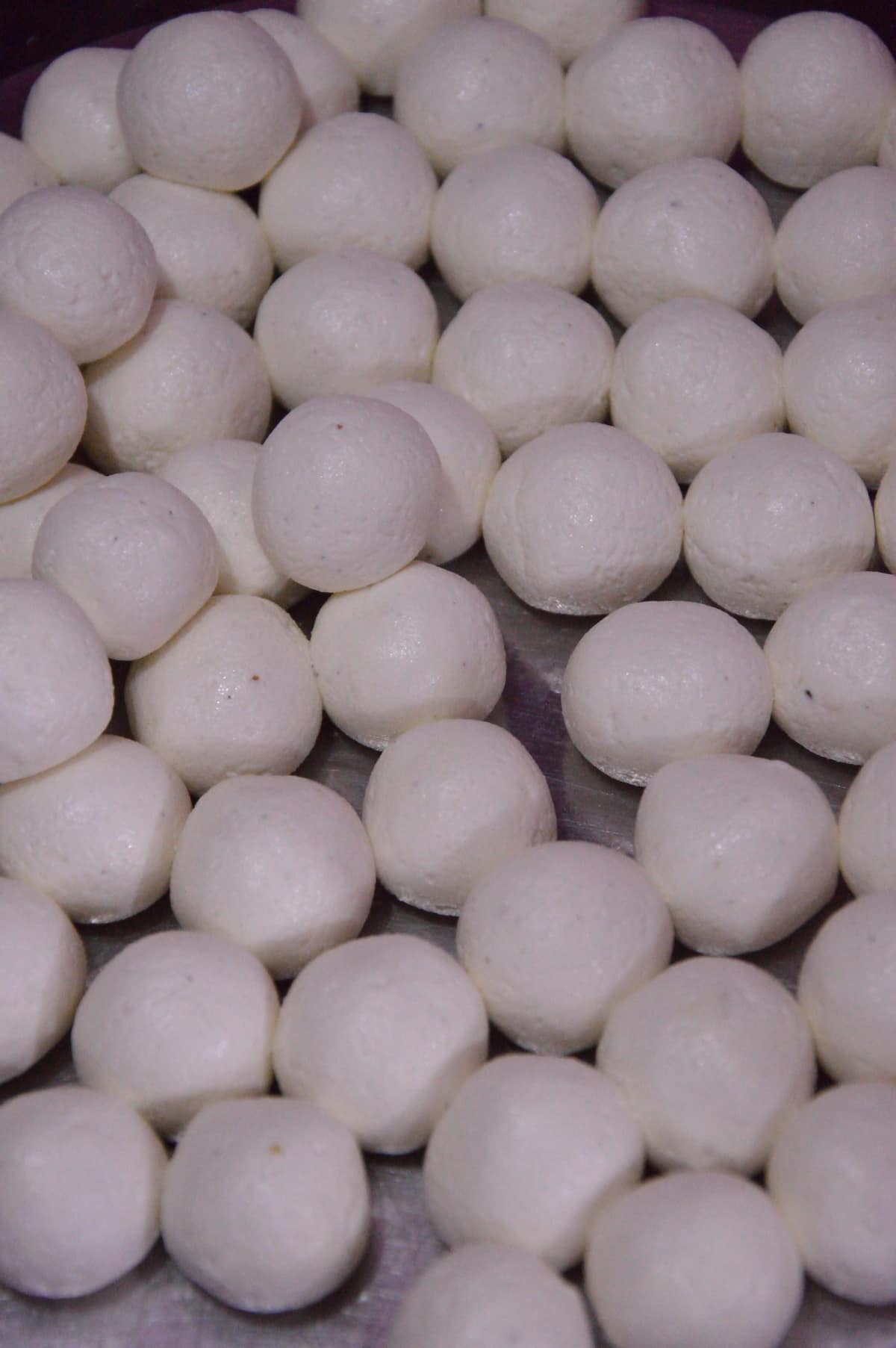 White roshogulla balls made from fresh kneaded chhena