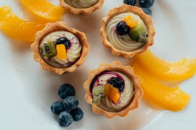 Fruit tartlets filled with light diplomat cream