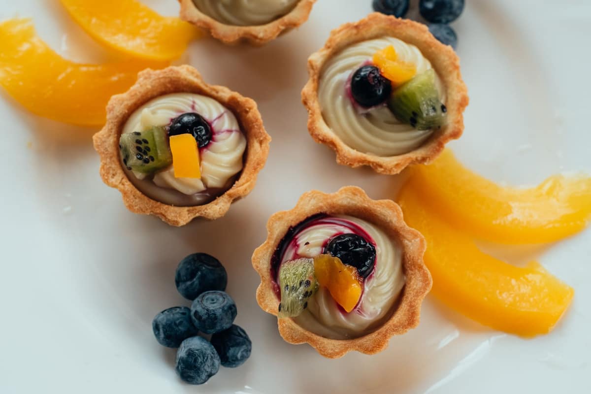 Fruit tartlets filled with light diplomat cream