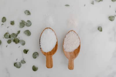Spoons of contrasting ingredients arranged for tasting