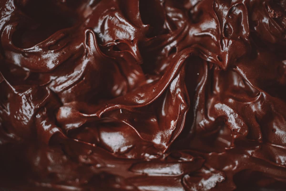 Dark chocolate ganache with a glossy, satin texture