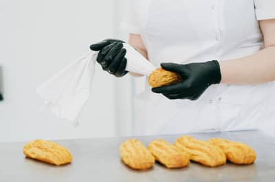 Éclairs filled with vanilla pastry cream