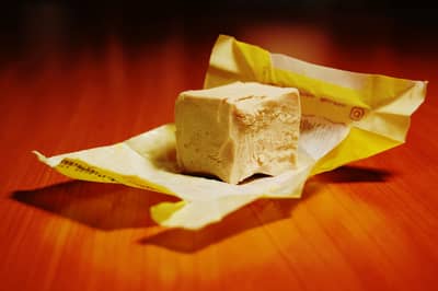 A crumbly block of fresh baker's yeast