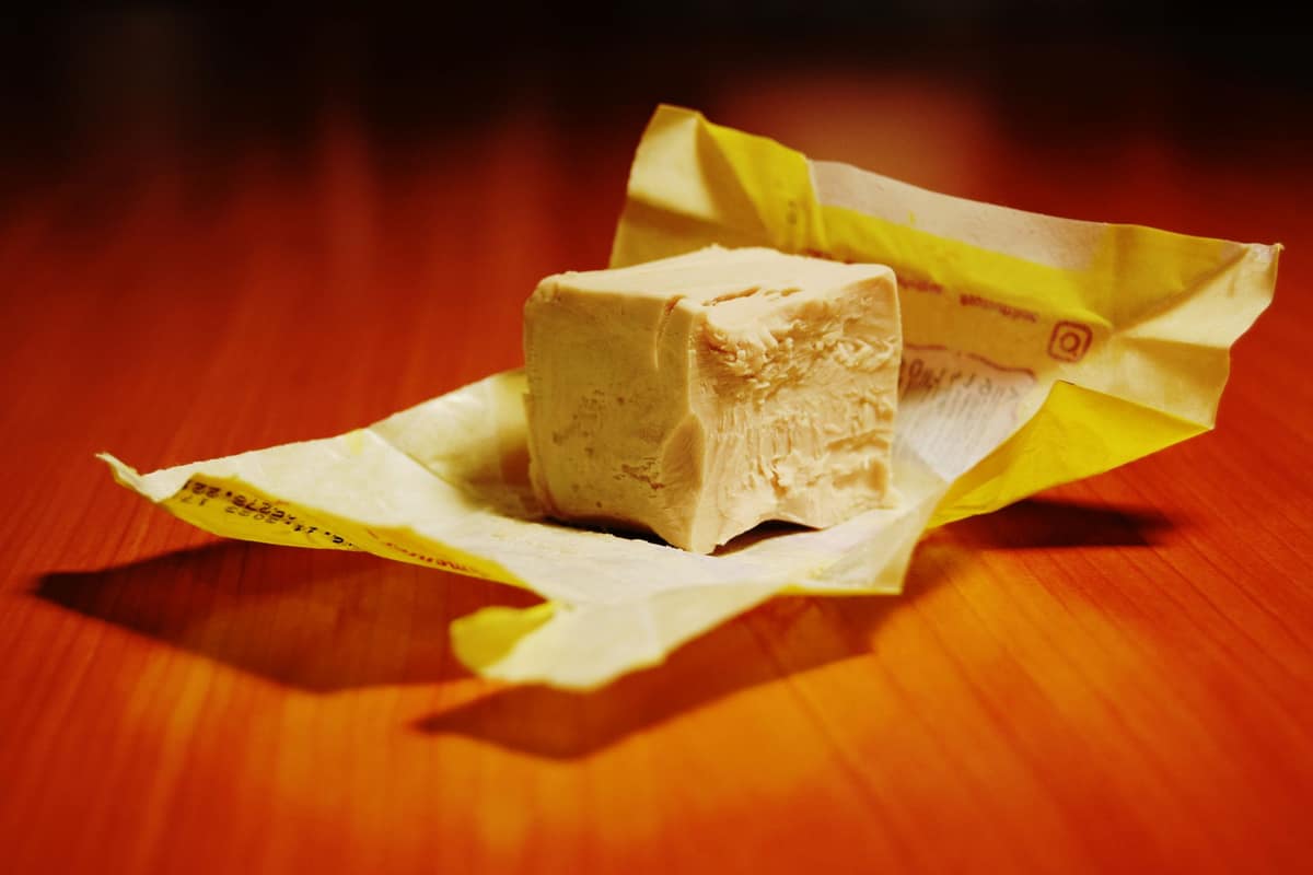 A crumbly block of fresh baker's yeast