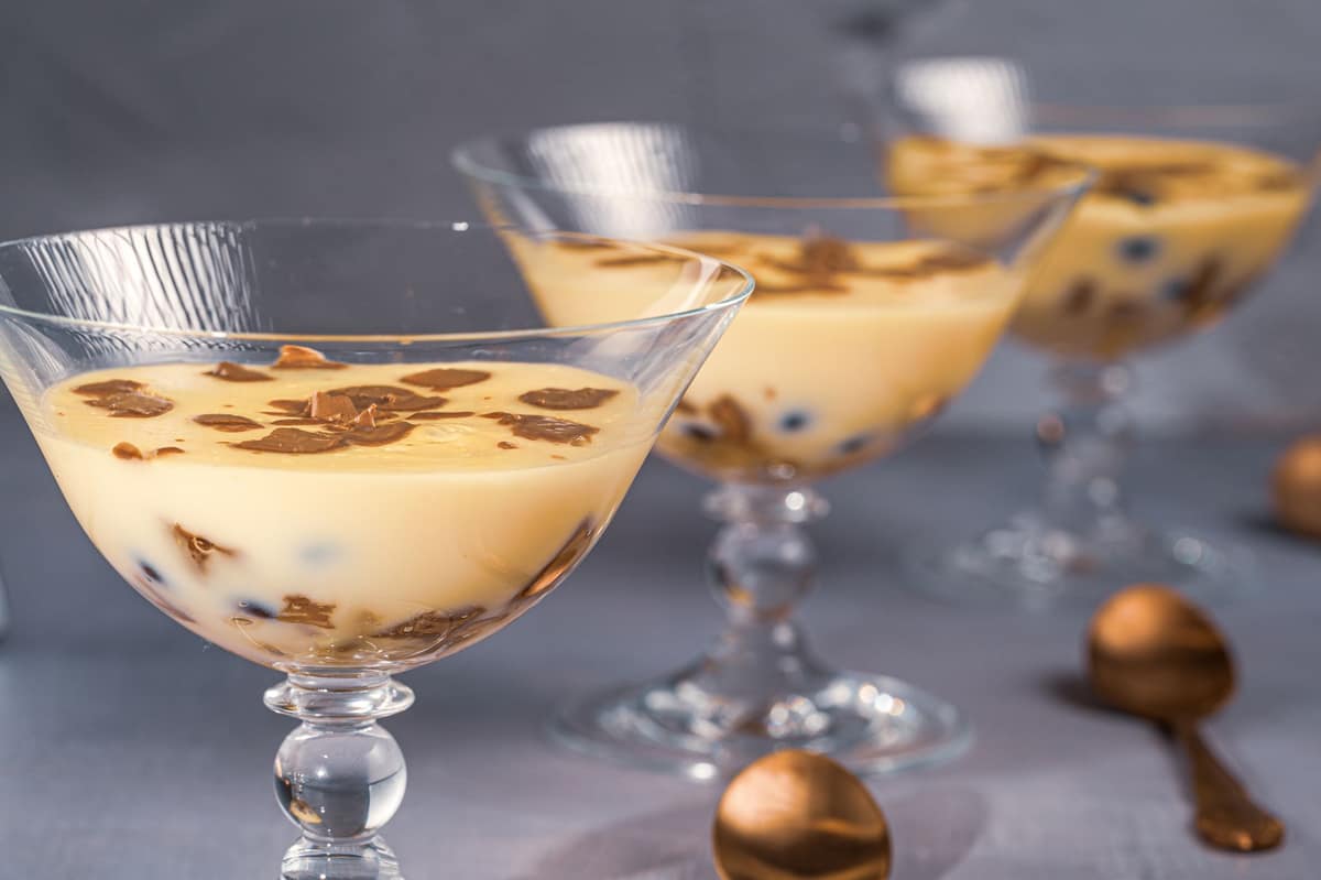 Zabaglione-style layered custard dessert served in coupe glasses